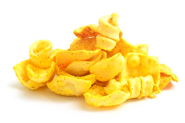 Spicy snack made with lentil flour isolated on a white background.